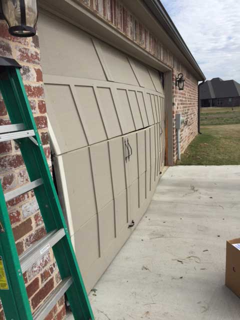 brokenGarageDoorExterior broken garage door exterior